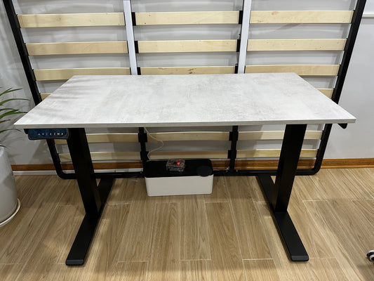 Electric dual-motor standing desk with height preset controls and grey surface - front view